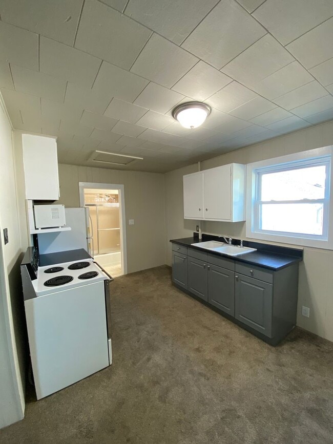 Photo - 1-Bedroom Home with 3-Stall Garage and Bonus Living Space