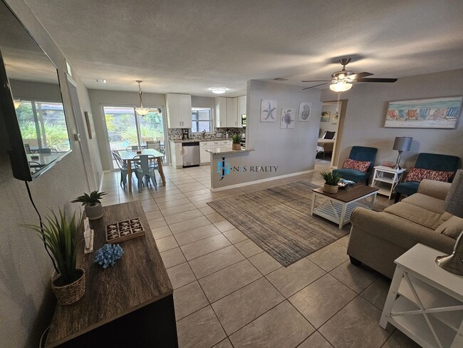 Photo - JUST REDUCED... must see beautiful 3/2 1071 Sq. Ft. with a POOL!! Gorgeous updated Kitchen & bath...