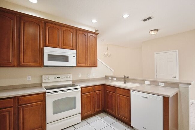 Photo - Beautiful 3/3.5 Townhome with a Spacious 2 Car Garage in the Gate Guarded Community of Spring Isl...