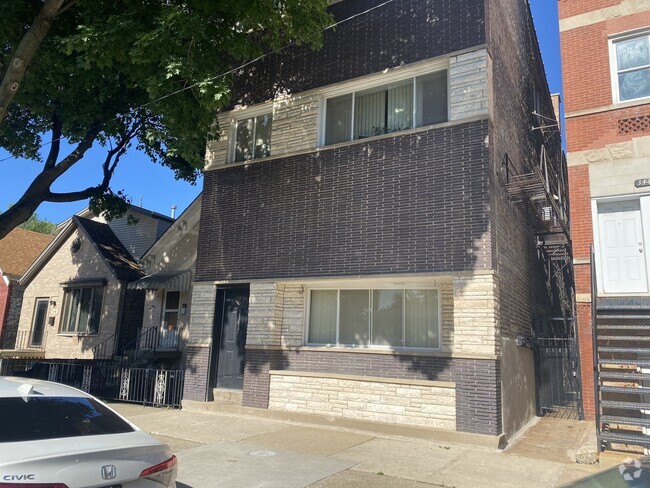Building Photo - 3145 S May St Unit 2R Rental
