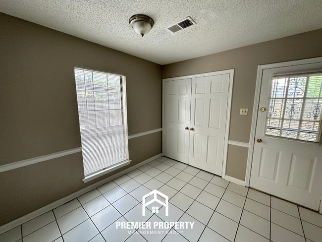 Photo - Charming 2BR/2.5BA Townhome | Dual Primary Suites, Fireplace & Fenced Yard