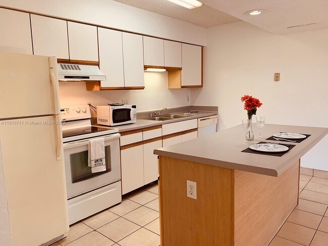 Building Photo - 4055 W McNab Rd Unit H104