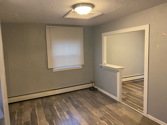Living area with opening to kitchen - 619 Copeland St Unit Apt 2 Studio