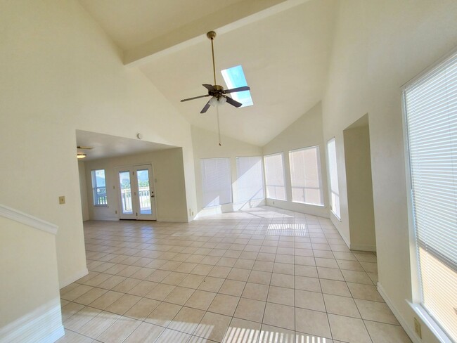 Photo - Fenced Jamaica Beach 3/2/1 Tri-level Home