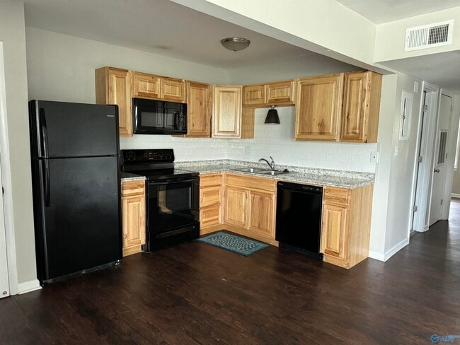Building Photo - 12105 Carriage Ct SE Unit B Rental