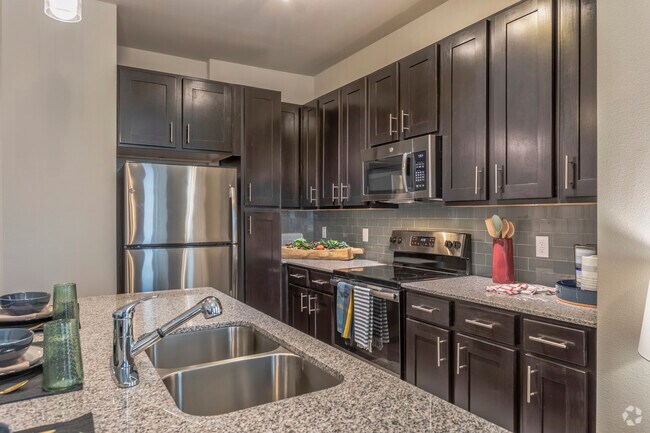 2BR, 2BA - 930 SF B1 - Kitchen