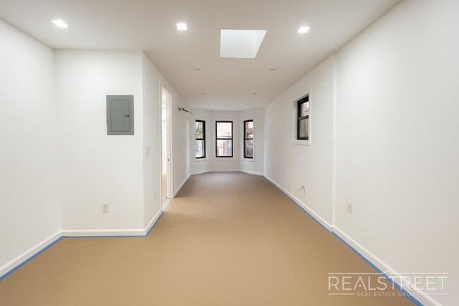 Photo - Spacious 2-Bedroom, 2-Bath Apartment in Bed-Stuy with Modern Amenities