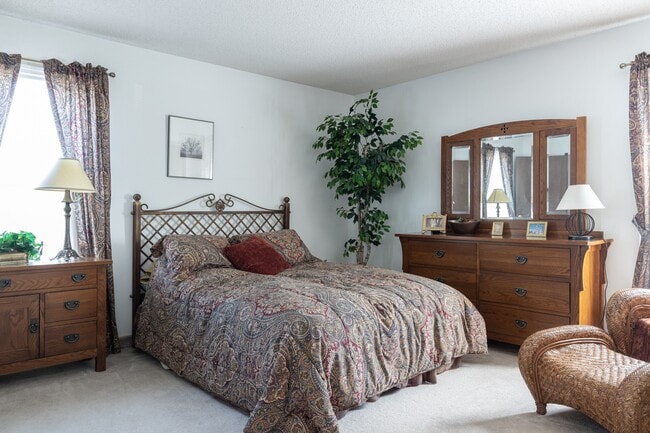 A cozy and inviting space for rest and relaxation in this one-bedroom apartment at Cedar Crest Apartments.