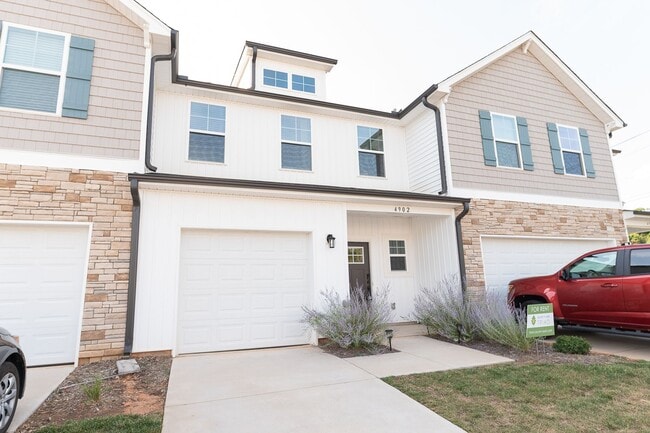 Photo - Like new modern maintenance free 3 bedroom 2.5 bath townhouse in Greensboro. Lawn care included.