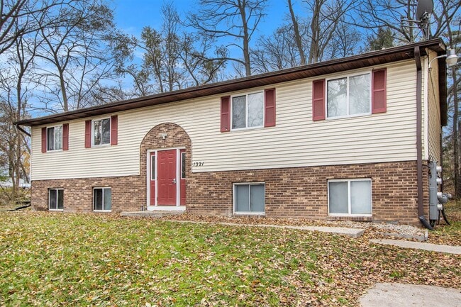 Photo - $1049 Renovated 2 bedroom 1 bathroom apartment with wooded views and patio Unit 1321 Huntington #2