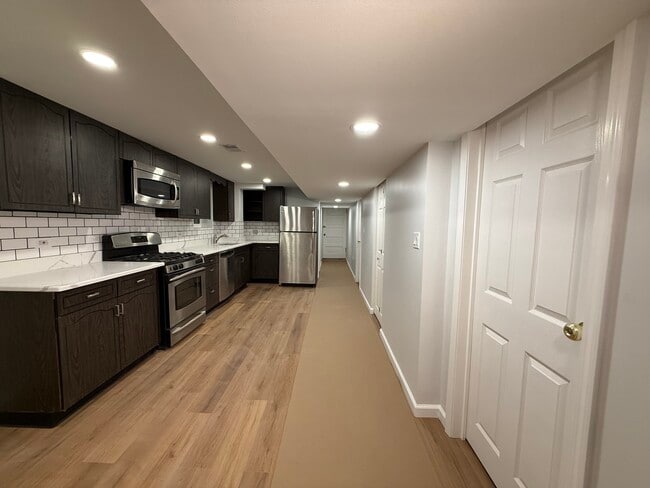 Kitchen with Pantry - 1542 N Kolin Ave Unit Garden
