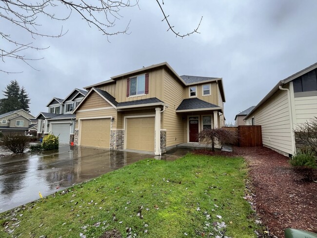 Photo - Stunning 2,588 Sq Ft Residence with Vaulted Primary Suite, Grand Staircase, and Granite Kitchen