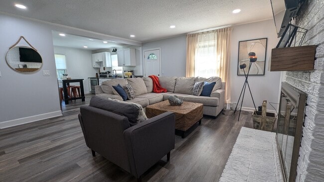 large farmily room open to kitchen and separate dining room