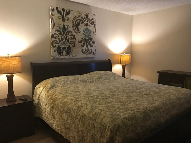 King Size Bed in Primary Bedroom - 400 N Sunrise Way Unit 169