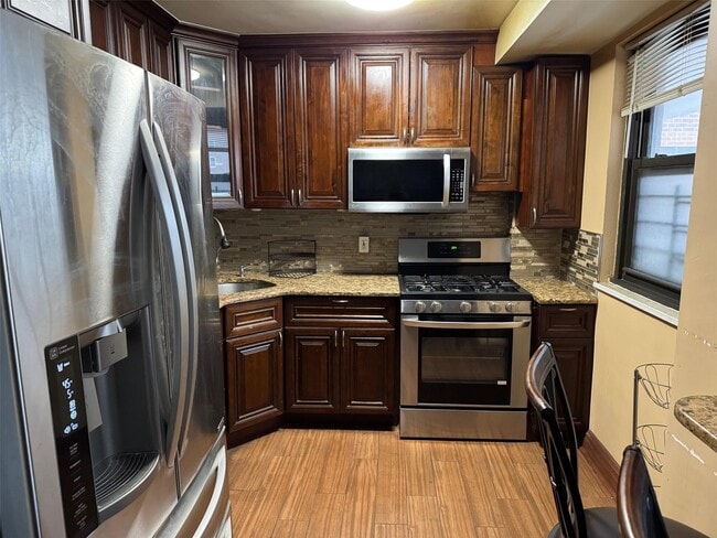 Photo - 61-55-61-98 98th St Condo Unit 14L