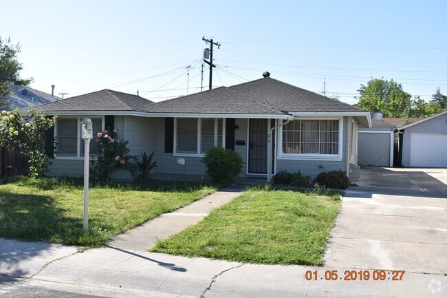 Building Photo - Charming Three Bedroom Home with New Carpe...
