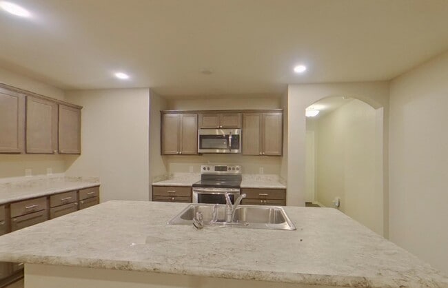 Photo - Spacious 4-Bedroom House with Cozy Living Spaces