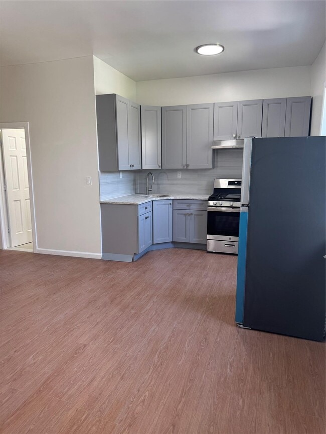 Photo - 56-07-56-39 39th Ave Townhome