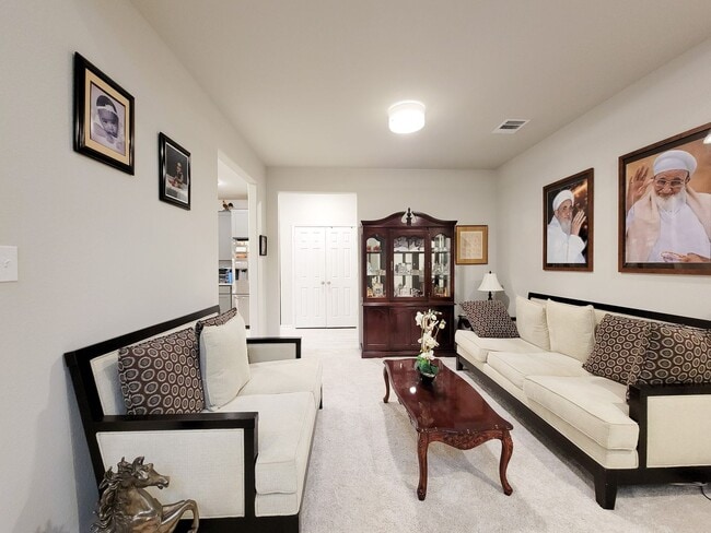 Photo - This stunning 2-year-old house with 4 beds, 3 baths, and an attached 2-car garage, it offers ampl...