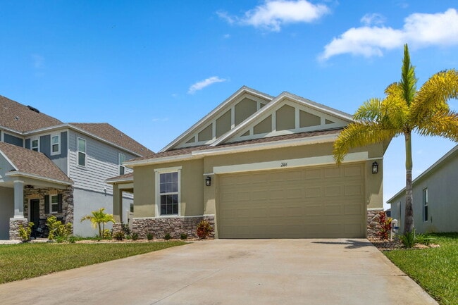 Building Photo - Elegant 3-Bed, 2-Bath Home in Gated Palm Bay Community with Resort-Style Amenities