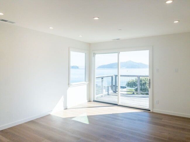 Photo - Stunning, Newly Remodeled, Top Floor Flat, Huge Private Deck,  Bay Views, Laundry! Parking! PROGR... Unit 10B