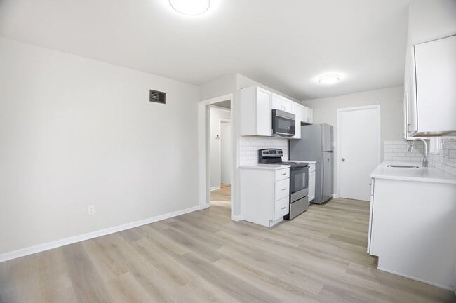 Photo - Updated 2 Bed, 1 Bath Home with Modern Finishes & Off-Street Parking