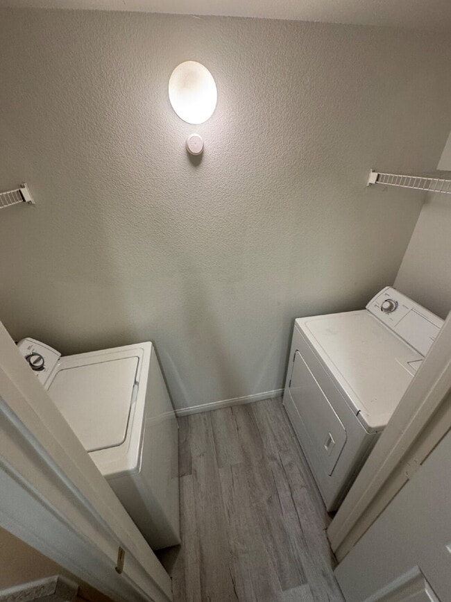 One bedroom, one full bath, FULL sized washer/dryer, with one carport AND a detached garage