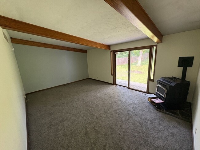 Photo - Spacious Home with Attached Garage & Fenced Backyard