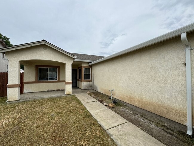 Photo - Three Bed, Two Bath Home with Two Car Garage