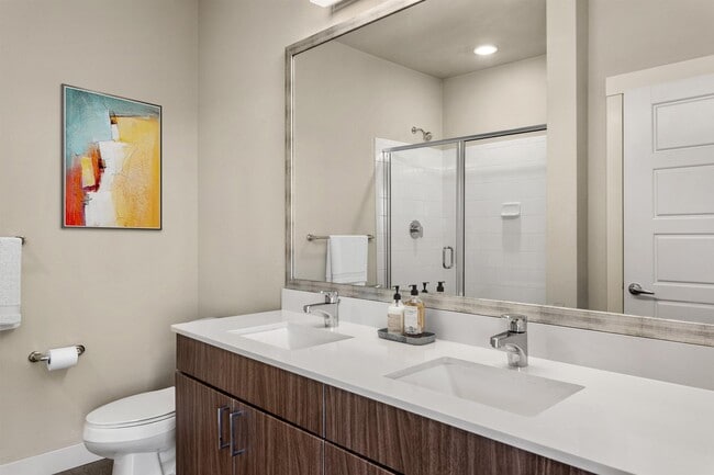 A double vanity here means two people can get ready side by side.