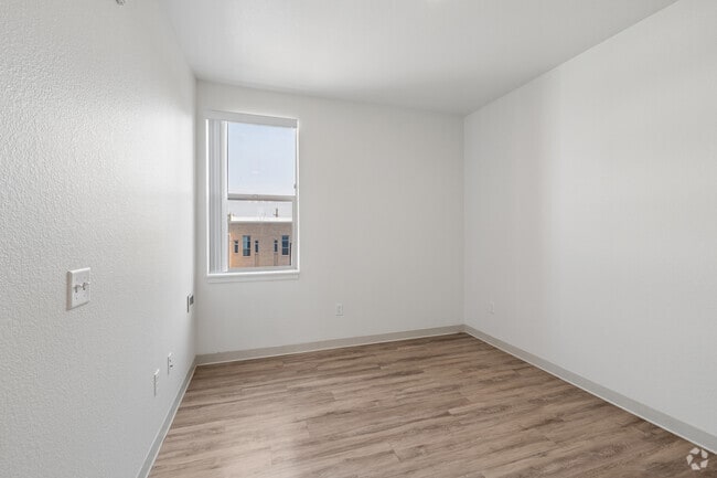 3BR, 2BA - 1,127SF - Primary Bedroom - Indy Street Flats