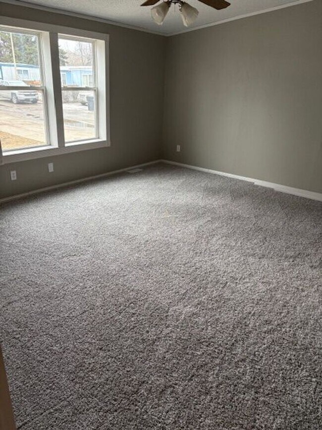 Photo - Spacious 4-Bedroom Home Available NOW in Skyway Park Village!