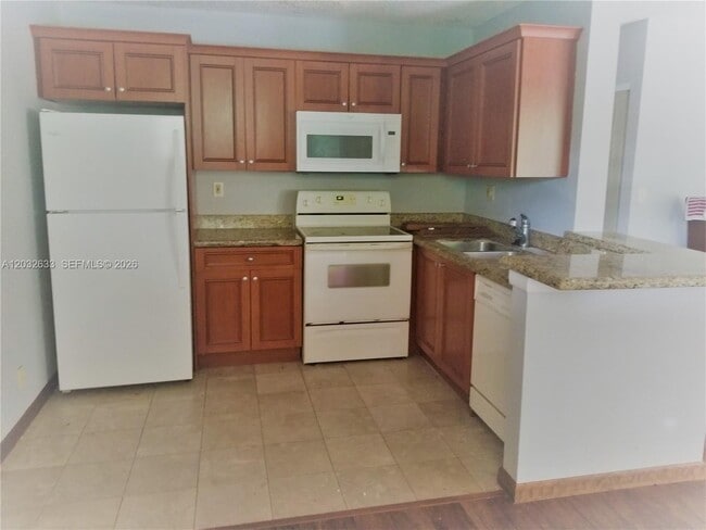 Building Photo - 11450 NW 43rd St Unit 11450