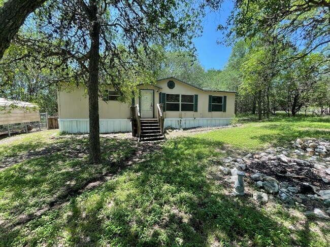 Photo - 3 bed 2 bath on one acre lot. New vinyl fl...