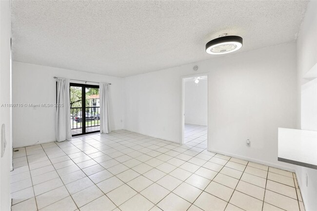 Building Photo - 9724 Hammocks Blvd Unit 203