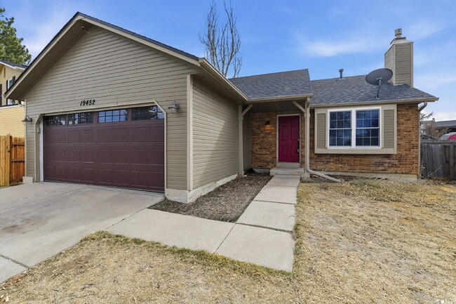 Photo - $2,695.95 - 4 Bed, 2 Bath Home in Aurora with Central AC, and In Unit Laundry!