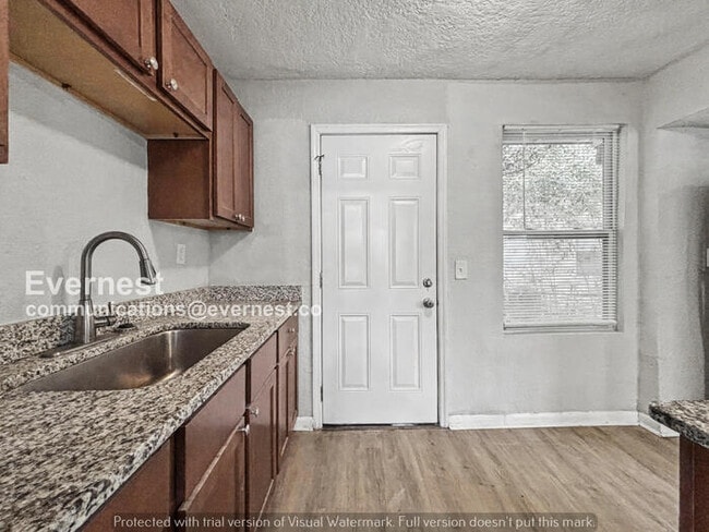 Photo - 3 Bed, 2 Bath Home with Modern Amenities / Pet-Friendly / Available Now!