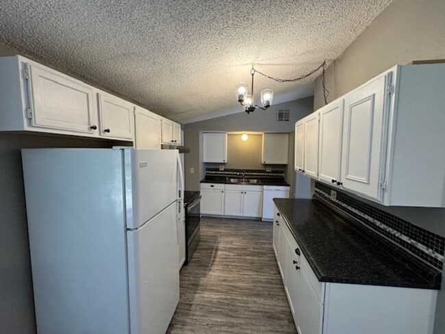 Photo - All New Inside, 3 bed 2 bath , no carpet, detached garage and fenced yard in Norman!