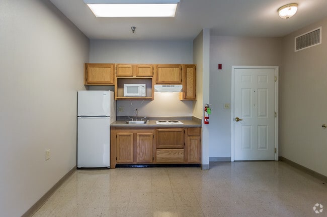 1 BR, 1 BA - 489 SF - Kitchen - Whispering Knoll Independent Senior Living