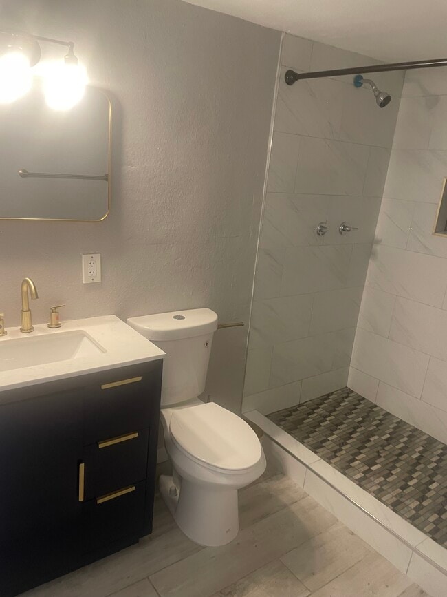 New bathroom with gold finishes - 2302 E Yale St Unit 1bdrm apartment