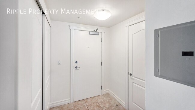 Photo - SOPHISTICATED 1-BED + DEN CONDO AT EMERALD STONE | MASSIVE PRIVATE PATIO & AC Unit 208