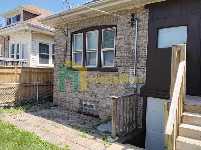 Photo - Spacious 5-Bedroom Brick Bungalow with Updated Interior