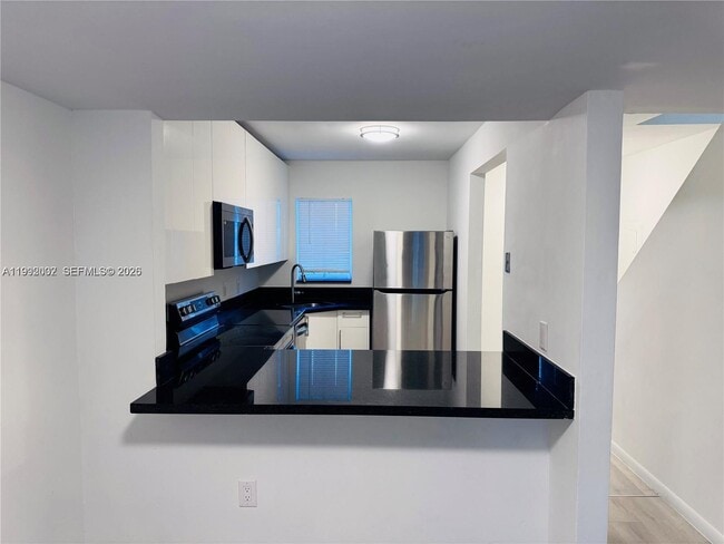 Photo - 2660 W 76th St Unit 207