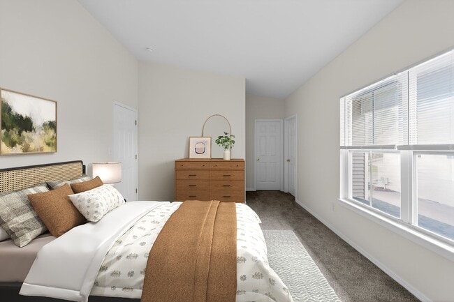 Welcome to Mansions at Delmar, an Eagle Rock Community, where modern design meets comfort. This inviting bedroom features natural light, stylish furnishings, and ample space for relaxation. Schedule a tour today and see your future home!