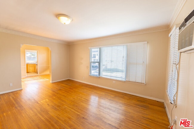 Building Photo - 8537 Cashio St Unit 1/2