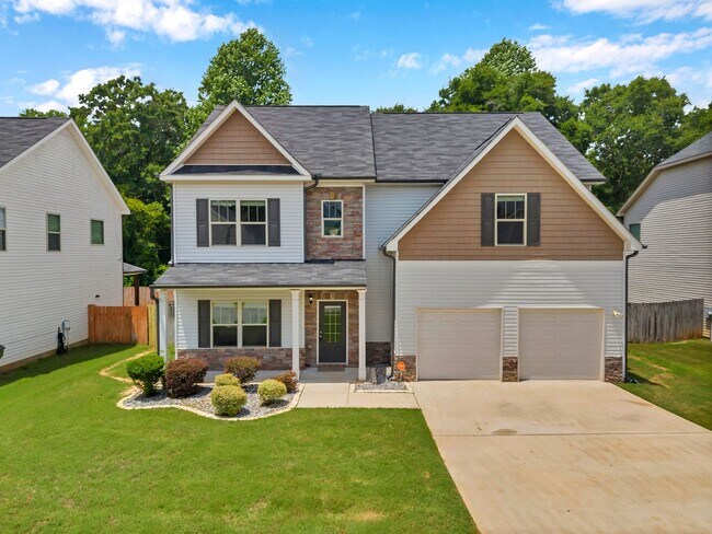Photo - Spacious 4BR Home with Fenced Yard & Community Pool