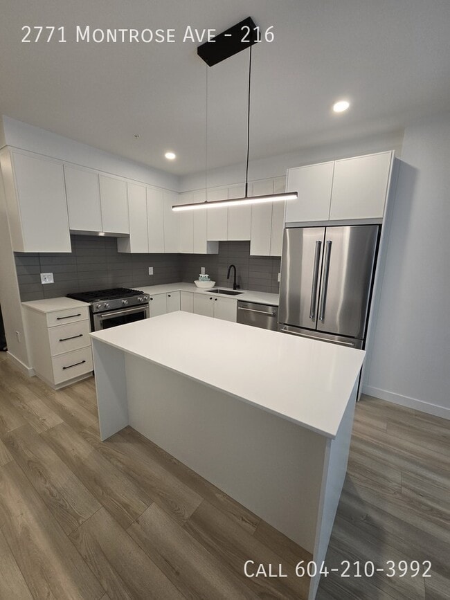 Building Photo - Brand New Condo in the Rail District Unit 216