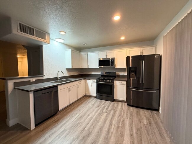 Photo - Updated 3-Bedroom Townhome in Gated Community with Pool Access