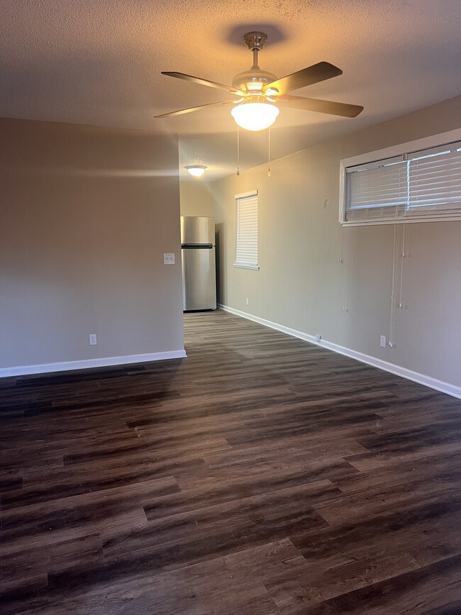 Living room into small dining area - 715 Reynolds St Unit No. 2