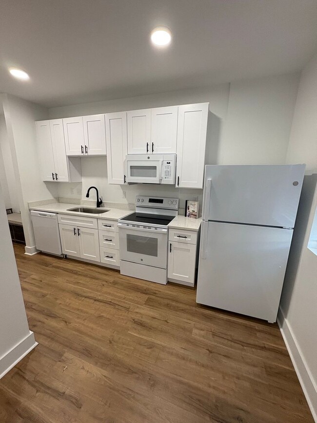 Building Photo - Welcome to Downtown living at its finest!